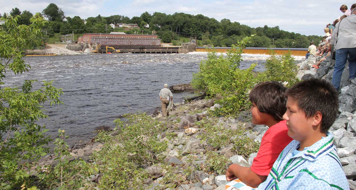 Young boys watching breaching of Veazie Dam on Penobscot River