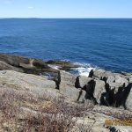 View of ocean from rocky trail