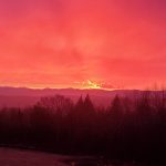 orange sky over mountains at sunset