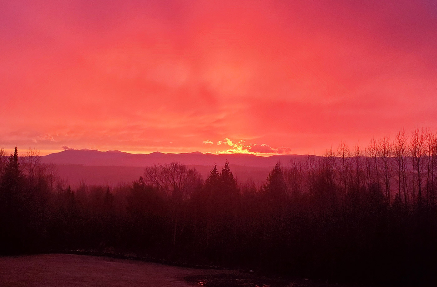 orange sky over mountains at sunset