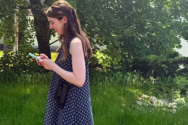 Kate-using-eBird-and-Merlin Kate using Merlin app. Photo by BWyman/NRCm