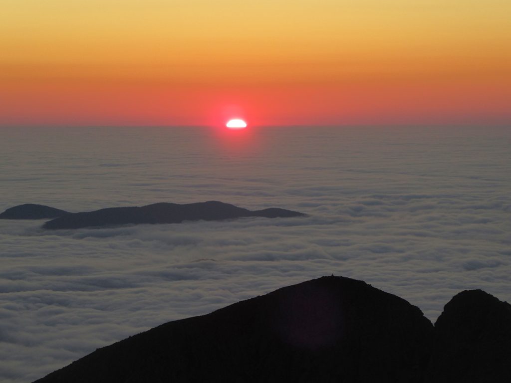 sunrise over clouds as seen from Katahdin