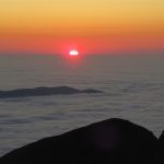 sunrise over clouds as seen from Katahdin