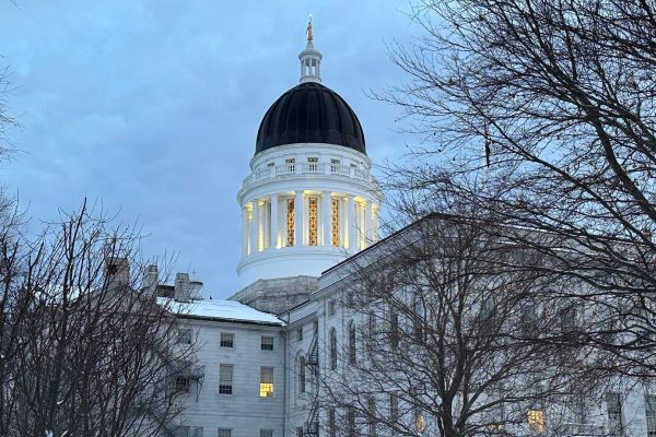 Maine State House with dome illuminated