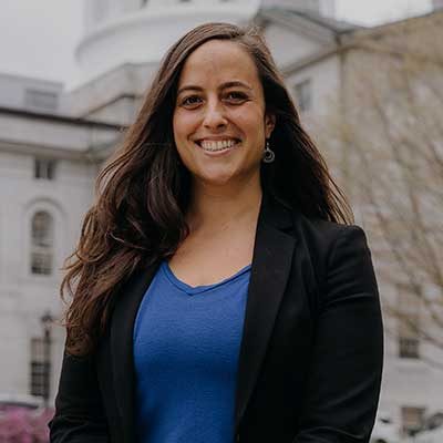 Anya Fetcher in front of State House